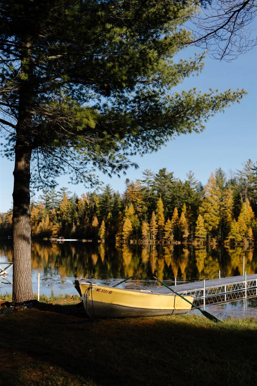Rowboat on Crooked Lake in fall